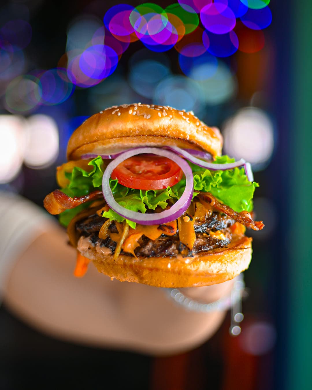 Loaded bacon cheeseburger held up at Cabo Joe's
