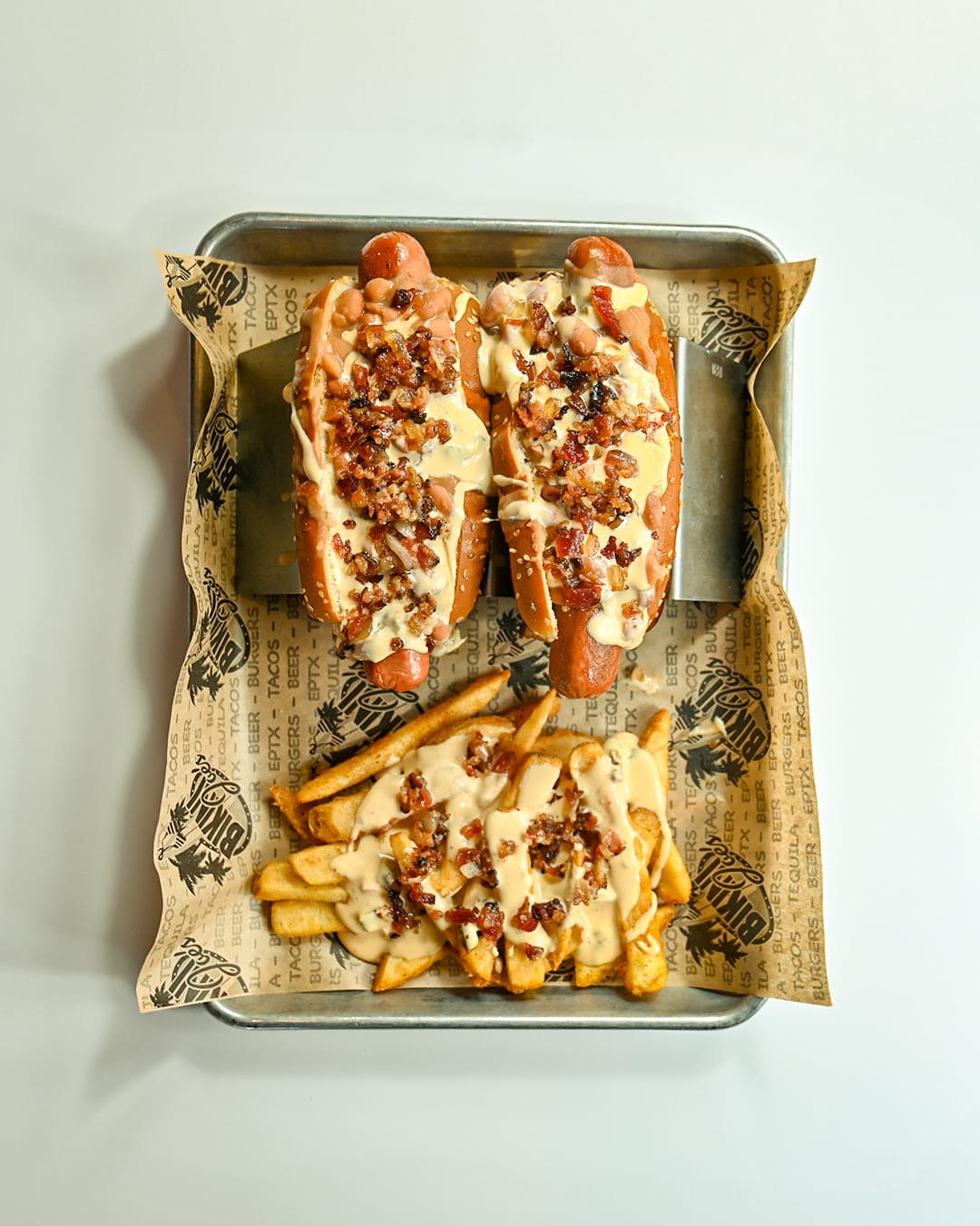Bacon-wrapped hot dogs with loaded fries at Cabo Joe's